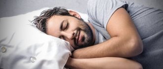 Bearded man sleeping in bed