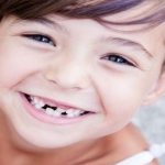 A child’s permanent tooth is growing incorrectly, what should I do?